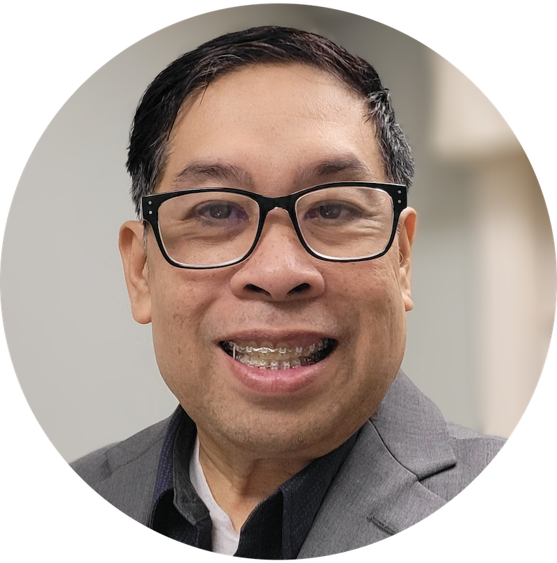 Headshot of Joey Estrella, Marian Executive Director